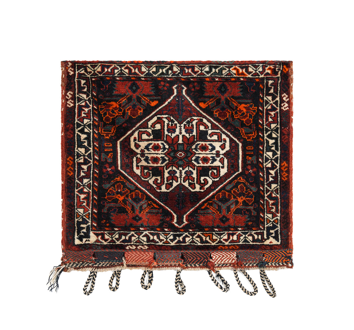 Vintage Persian tribal salt bag face 2.3 x 2 ft, handwoven in wool with geometric motifs, kilim details and braided tassels, circa 1940s.